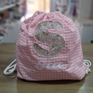 Mochila inicial + nombre